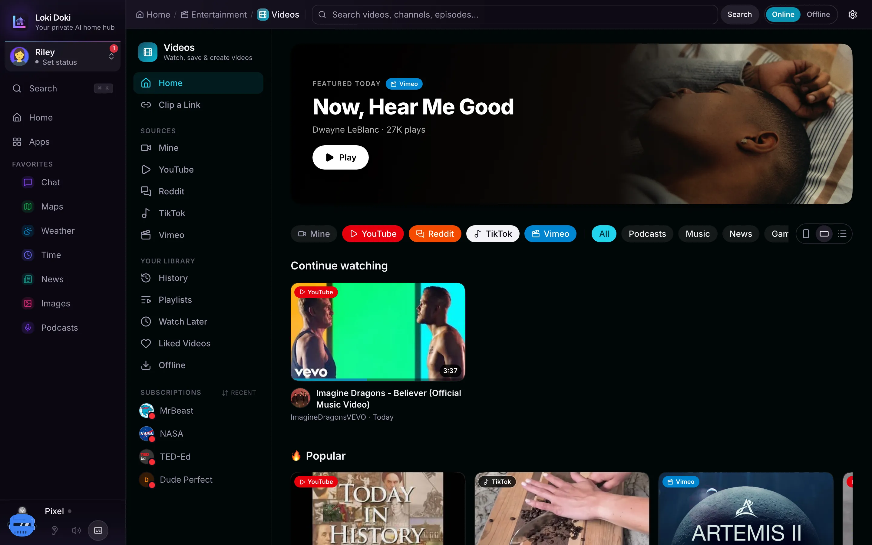 The Videos home feed mixing trending content from YouTube, Vimeo, and other enabled sources into one calm grid